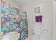 Bathroom featuring colorful shower curtain and nautical decor accents at 4612 River Farm Rd, Rocky Mount, NC 27803