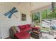 Comfortable porch with a cozy seating area at 4612 River Farm Rd, Rocky Mount, NC 27803