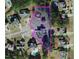Aerial view of property lines including the home, landscaping, other neighboring properties, and surrounding streets at 48 Falling Oak Ct, Clayton, NC 27520