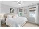 Comfortable bedroom with two windows allowing plenty of natural light at 48 Falling Oak Ct, Clayton, NC 27520