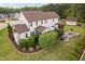 Expansive home exterior shows well-manicured lawn and patio areas, perfect for outdoor living at 48 Falling Oak Ct, Clayton, NC 27520