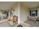 Inviting front porch with a swing, bench, and tasteful decor, perfect for relaxing outdoors at 48 Falling Oak Ct, Clayton, NC 27520
