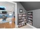 Stylish entertainment room featuring a Tarheels theme, custom bar, and comfortable seating options at 48 Falling Oak Ct, Clayton, NC 27520