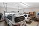 Spacious two car garage with ample storage, workspace, and convenient access to vehicles at 48 Falling Oak Ct, Clayton, NC 27520