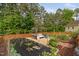 Garden with pergola swing, and growing plants at 48 Falling Oak Ct, Clayton, NC 27520