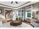 Inviting living room with views into the dining area and a comfortable seating arrangement at 48 Falling Oak Ct, Clayton, NC 27520