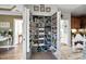 Walk-in pantry with pull-out shelving provides maximum storage for all your cooking needs at 48 Falling Oak Ct, Clayton, NC 27520