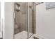 Beautiful shower with tile surround and glass door at 48 Falling Oak Ct, Clayton, NC 27520