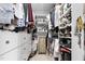 Custom walk-in closet with plenty of shelf and drawer space for optimal storage at 48 Falling Oak Ct, Clayton, NC 27520