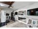 Home workout area with mirrored walls, modern equipment and wood ceilings at 48 Falling Oak Ct, Clayton, NC 27520