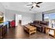 Living area features recessed lighting, hardwood floors and a leather sofa at 5004 Clowser Minnow Ct, Wake Forest, NC 27587