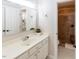Bright bathroom featuring a large vanity, mirror and a walk-in shower with decorative tile and built-in bench at 5129 Bartons Enclave Ln, Raleigh, NC 27613