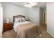 Comfortable bedroom with a ceiling fan, neutral tones, and inviting decor elements at 5129 Bartons Enclave Ln, Raleigh, NC 27613