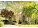 Traditional home with lush landscaping, mature trees, and a welcoming front facade at 5129 Bartons Enclave Ln, Raleigh, NC 27613