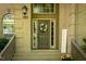 Charming home entrance with a welcoming front door and decorative wreath at 5129 Bartons Enclave Ln, Raleigh, NC 27613