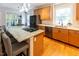 Well-appointed kitchen with stainless appliances, granite countertops, and light fixture at 5129 Bartons Enclave Ln, Raleigh, NC 27613