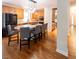 Kitchen island with bar stool seating and stainless appliances, great for entertaining or meal prep at 5129 Bartons Enclave Ln, Raleigh, NC 27613