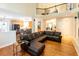 Spacious living room with high ceilings, hardwood floors, and view of the kitchen and upper level at 5129 Bartons Enclave Ln, Raleigh, NC 27613