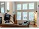 Bright living room featuring a fireplace, high ceilings and plenty of natural light at 5129 Bartons Enclave Ln, Raleigh, NC 27613