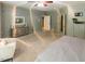 Expansive main bedroom featuring neutral walls, plush carpet, ceiling fan and stylish furnishings at 5129 Bartons Enclave Ln, Raleigh, NC 27613