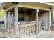 Outdoor bar area featuring stone accents, a built-in bar, and a lounge area at 5129 Bartons Enclave Ln, Raleigh, NC 27613