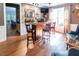 Cozy wet bar with wood finishes, brick accents, barstool seating, and lots of natural light at 5129 Bartons Enclave Ln, Raleigh, NC 27613