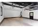 Spacious garage with an open ceiling and ample room for storage and parking at 603 Warren Rd, Erwin, NC 28339