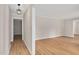 Spacious living room with light walls and wood flooring, offering a modern and inviting atmosphere at 603 Warren Rd, Erwin, NC 28339