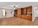 Open-concept living room showcases custom wood built-ins, offering ample storage and stylish design at 603 Warren Rd, Erwin, NC 28339