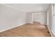 Bright living room featuring wood floors, neutral walls, and ample natural light from large windows at 603 Warren Rd, Erwin, NC 28339