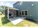 Inviting screened porch and patio, with yard at 608 Cormiche Ln, Wake Forest, NC 27587