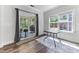 Cozy breakfast nook with large windows and sliding glass doors leading to the outdoors at 608 Cormiche Ln, Wake Forest, NC 27587