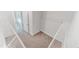 A carpeted walk-in closet is equipped with sturdy wire shelving for storage at 608 Cormiche Ln, Wake Forest, NC 27587