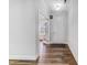 Welcoming foyer with hardwood flooring and a view through French doors at 608 Cormiche Ln, Wake Forest, NC 27587