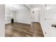 Open-concept living room featuring hardwood floors and recessed lighting at 608 Cormiche Ln, Wake Forest, NC 27587