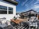 Stylish rooftop deck with a mix of lounge seating and dining areas for relaxation at 611 Walnut Hts Dr # 101, Raleigh, NC 27610