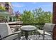 Comfortable balcony space with outdoor seating and serene views of surrounding greenery at 618 N Boylan Ave # 400, Raleigh, NC 27603