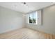 Bedroom with hardwood floors and a large window with bright natural light at 618 N Boylan Ave # 400, Raleigh, NC 27603
