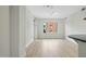Spacious living room with light hardwood floors and large windows that allow natural light at 618 N Boylan Ave # 400, Raleigh, NC 27603