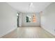 Inviting living room with wood floors, neutral paint, and large windows offering natural light at 618 N Boylan Ave # 400, Raleigh, NC 27603