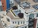 A luxurious roof deck features elegant seating areas, decorative greenery, and a stylish design at 618 N Boylan Ave # 400, Raleigh, NC 27603