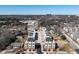Aerial shot of a neighborhood with a street bisecting new townhouses at 620 Walnut Heights Dr # 103, Raleigh, NC 27610
