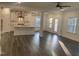Open living area features a kitchen with an island, stainless steel appliances, and lots of natural light at 633 Hardin Hill Ln, Knightdale, NC 27545