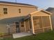 View of the house with a nice screened in back porch and a patio at 633 Hardin Hill Ln, Knightdale, NC 27545