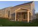 View of the house with a nice screened in back porch and landscaping at 633 Hardin Hill Ln, Knightdale, NC 27545