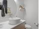 Modern bathroom with a stylish bowl sink, elegant faucet, and sleek fixtures at 66 Romie Ct, Pittsboro, NC 27312