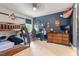 Cozy bedroom with bunk beds, a study area, and playful decor, creating a fun and functional space at 66 Romie Ct, Pittsboro, NC 27312