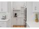 Modern kitchen features stainless steel appliances, ample storage, and a coffee bar at 66 Romie Ct, Pittsboro, NC 27312