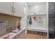 Mudroom entrance with storage cubbies and black accent door at 66 Romie Ct, Pittsboro, NC 27312