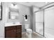 Modern bathroom featuring a sleek vanity, toilet, and a glass-enclosed shower, offering a clean and functional design at 70 Saintsbury Dr, Fuquay Varina, NC 27526